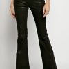 FRAME Le High Flare Jean In Coated Noir | Frame - T. Boutique | Bottoms